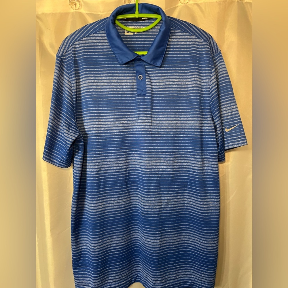 Men’s Nike golf shirt size large. Blue striped. Size large. Good used condition